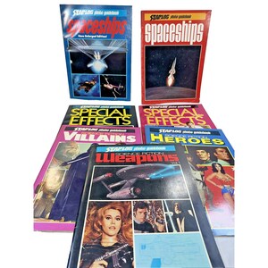 May include: A collection of seven Starlog photo guidebooks featuring science fiction themes. The books include titles such as Spaceships, Special Effects, Science Fiction Villains, Science Fiction Heroes, and Science Fiction Weapons, all with colorful covers.