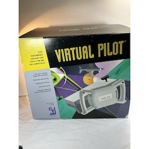 May include: A black and yellow product box for a Virtual Pilot high performance airplane yoke. The box features a graphic of a gray flight yoke, a jet airplane, and text including "Virtual Pilot" and "High performance airplane yoke for all IBM".