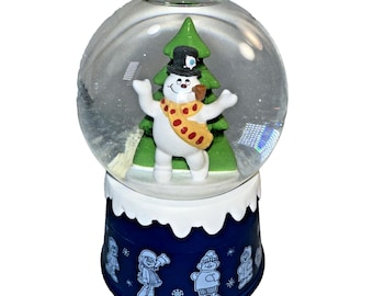 Bola de nieve/caja de música vintage de Hallmark "Frosty el muñeco de nieve" (reproduce la canción de Frosty).