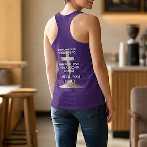 Puede incluir: Una camiseta sin mangas morada con texto blanco y un gráfico. El texto dice "YOU CAN GIVE YOUR E TO AND WILL GIVE YOU A SECOND CHANCE UNTIL YOU CAN'T". El gráfico es una cruz y un montón de cenizas.