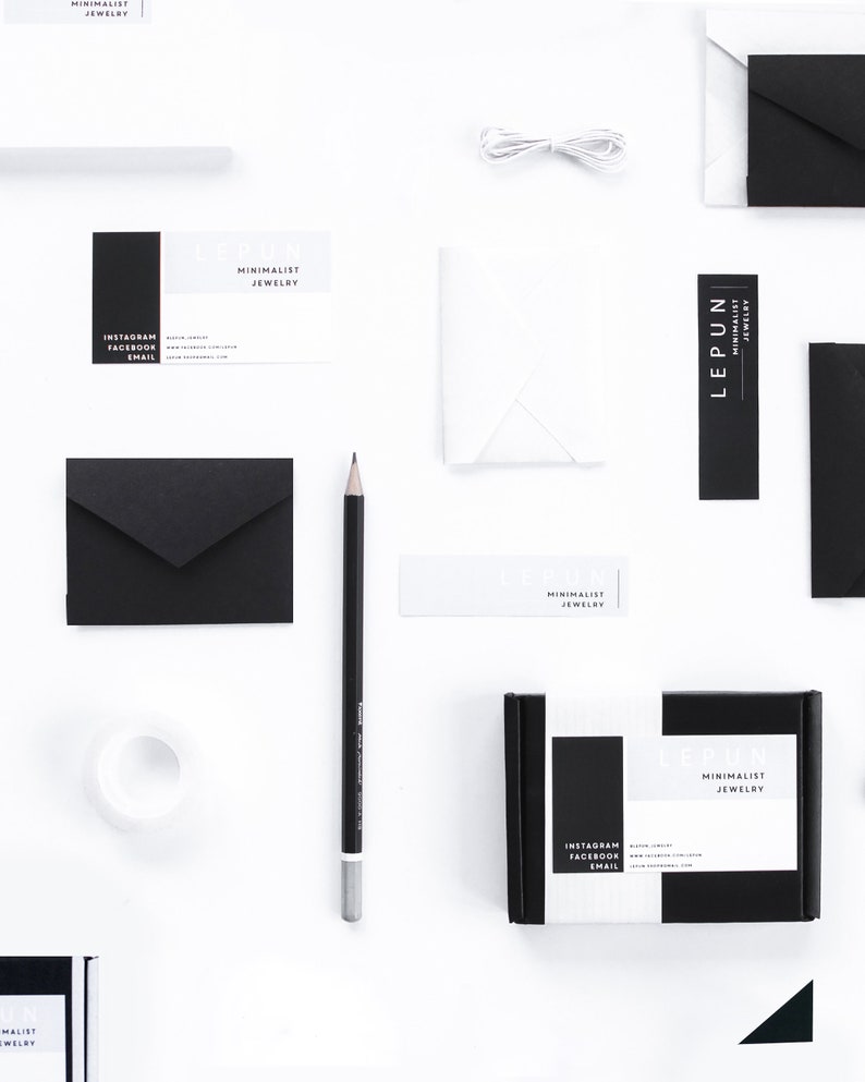 May include: A flat lay featuring minimalist jewelry branding materials. The composition includes black and white business cards, envelopes, a pencil, and a small box. The brand name "LEPUN" is prominently displayed, along with social media handles and email.