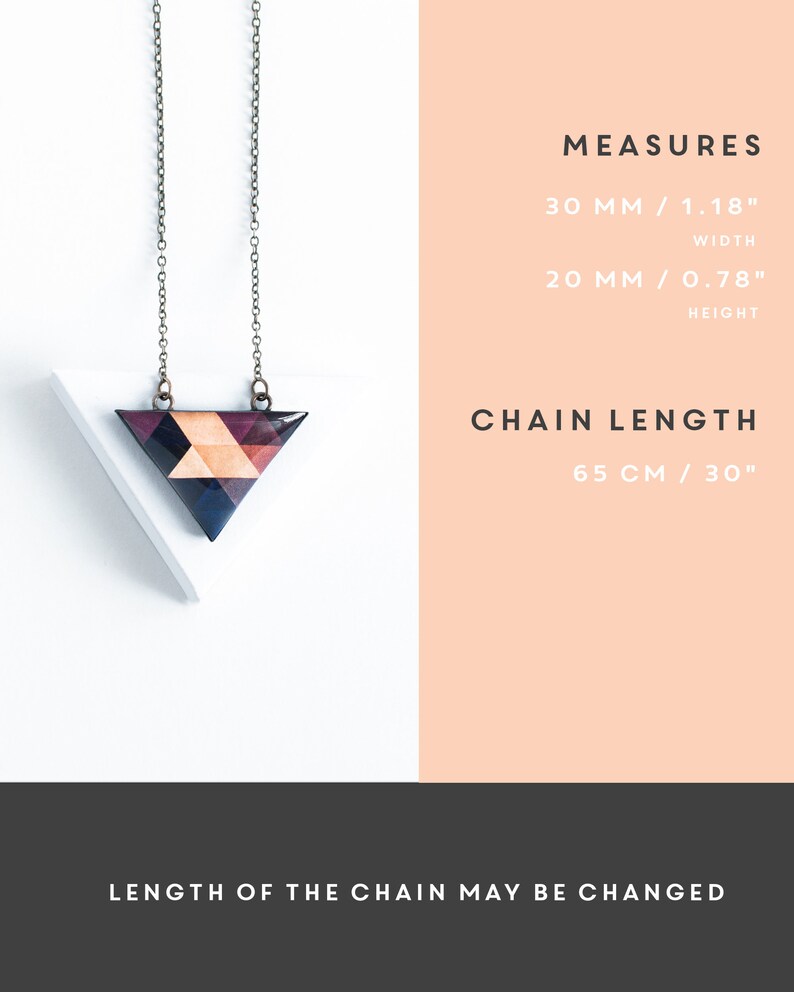 May include: A geometric pendant necklace with a triangular pendant. The pendant is made of wood and features a mosaic design in shades of brown, black, and peach. The chain is 30 inches long. The pendant measures 1.18 inches wide and 0.78 inches high. The text says "LENGTH OF THE CHAIN MAY BE CHANGED."