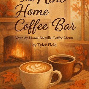 Può includere: Una copertina di libro illustrata intitolata "The Nino Home Coffee Bar" con un tema autunnale caldo. Due tazze di caffè sono su un tavolo di legno, una con latte art. Lo sfondo presenta un camino e una finestra.