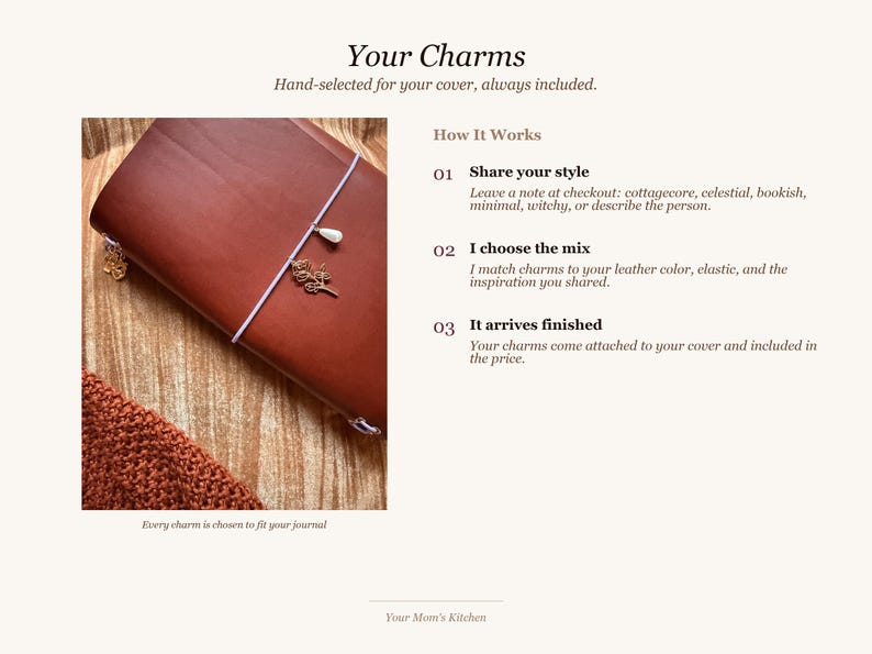 May include: A brown leather journal with a white string closure and decorative charms. The text "Your Charms" and "Hand-selected for your cover, always included" are displayed. The journal is shown with a knitted brown scarf.