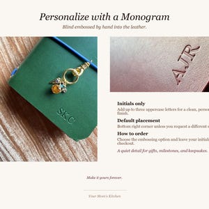 May include: Green leather journal with gold charm and embossed initials. The text "Personalize with a Monogram" and instructions for personalization are included. The journal is a quiet detail for gifts, milestones, and keepsakes.