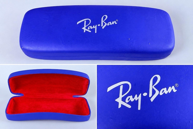 Estuche rígido azul para gafas Ray-Ban con interior rojo y acabado mate tipo concha. imagen 1