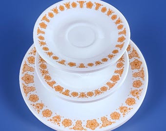 Juego de 11 piezas de platos llanos y platillos de pan Corelle Butterfly Gold estilo retro de los años 70.