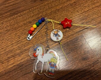 Friendship pin with Rainbow Friend charm