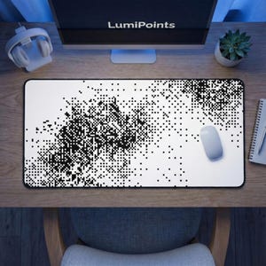 May include: A white and black pixelated design mouse mat with a white mouse. The monitor in the background has the text "LumiPoints". The mouse mat is on a wooden desk.
