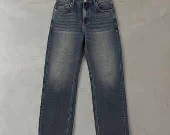 Blue wide leg jeans with a relaxed y2k style