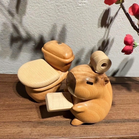 A handcrafted miniature capybara that lives on your toilet — the unexpected zen desk/bathroom companion nobody knew they needed.