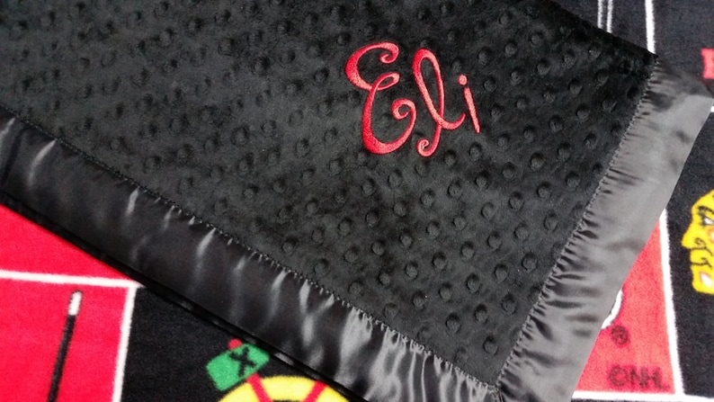 Personalized Chicago Blackhawks Hockey Fleece and Minky Baby Blanket burp rag or bib. Also available as a pillow