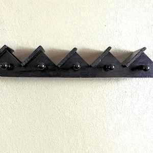 Vintage Black Slanted Shelf with Knobs