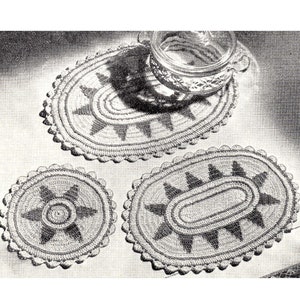 May include: Three crocheted oval and round dish mats in white and gray with a starburst design.  Make these useful heat-resisting dish mats in colours to match your table scheme. Above, a section of the treble crochet (reduced).