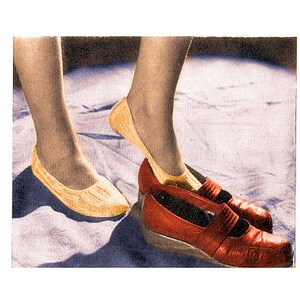 May include: A vintage knitting pattern for stockings from the 1940s. The pattern features a woman's legs wearing stockings and shoes. The text "Save Your Stockings 1940's Knitting Pattern" is printed on the image.