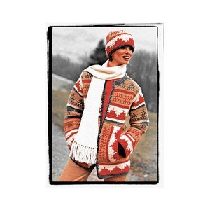 May include: A crocheted jacket with a geometric pattern in red, white, brown, and beige. The jacket has a white crocheted scarf and a matching crocheted hat.