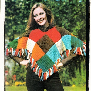 May include: A colorful crocheted poncho with fringe. The poncho is made of different colored squares in red, orange, green, blue, white, and brown.
