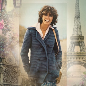 May include: A woman in a dark blue, double-breasted, knitted jacket over a light pink collared shirt, smiling. She wears a gold necklace and carries a brown purse. The background includes the Eiffel Tower and Notre Dame, evoking a Parisian theme.