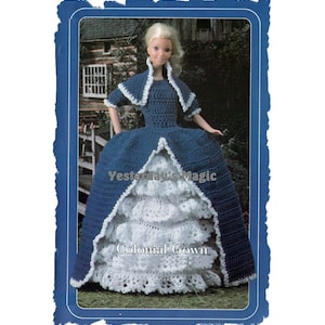 May include: A crochet pattern for a colonial gown for a doll. The pattern is called "Yesterday's Magic Colonial Gown". The gown is blue with a white lace trim.