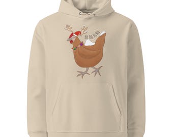 Könnte beinhalten: Beiger Kapuzenpullover mit einem Cartoon-Huhn, das einen Weihnachtsmannhut und Rentiergeweih trägt. Das Huhn hat eine festliche Halskette und die Worte "HO HO HURN" sind auf der Rückseite aufgedruckt. Der Hoodie hat eine Vordertasche und eine Kapuze.