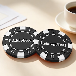 May include: Two circular black and white poker chips featuring dice patterns on the outer rim. The left chip displays the text Add photo in white, while the right chip displays the text Add Logo/Text in white on the center matte black surface.