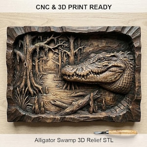May include: A brown wooden relief carving of an alligator in a swamp scene. The artwork is framed and features the text "CNC & 3D PRINT READY" and "Alligator Swamp 3D Relief STL". A carving tool rests below the artwork.