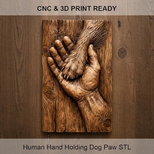 May include: A wooden relief sculpture of a human hand holding a dog's paw. The sculpture is carved from a rectangular piece of wood with visible grain and knots. The text "CNC & 3D PRINT READY" and "Human Hand Holding Dog Paw STL" are at the top and bottom.