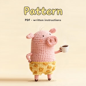 May include: A crocheted pig doll in pink with yellow shorts holding a small white cup of coffee. The pig has a large snout, small ears, and is standing upright. The image includes the text "Pattern" and "PDF - written instructions".