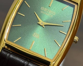 Vintage Seiko Quartz Watch: Slim Stainless Steel, Leather Band