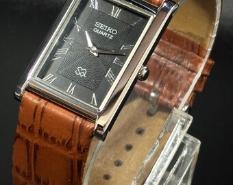 Reloj de pulsera Seiko vintage único con tanque delgado: cuarzo, reloj de cuero,