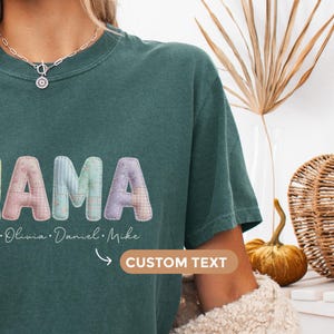 Custom mama shirt with a faux patchwork design. Add your kids’ names and choose from soft pastel colors for a sweet, personalized look.