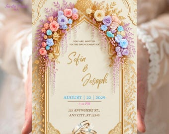 May include: A cream-coloured engagement invitation with gold filigree detailing. The invitation displays the names "Sofia & Joseph" in a stylish script, along with the date and time. A floral arch with pastel roses and other flowers frames the text.