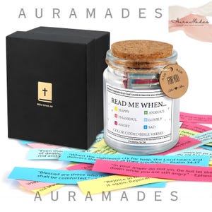 May include: A black box with a gold cross icon next to a glass jar with a cork lid. The jar contains colorful Bible verses. A small tag says "For You". The jar is labeled "Read Me When..." and lists emotions.