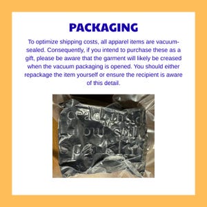 May include: A vacuum-sealed package containing an apparel item. The text on the package is partially visible, with the words "ceadkinsic bussill" discernible. The packaging is transparent, allowing a glimpse of the contents.