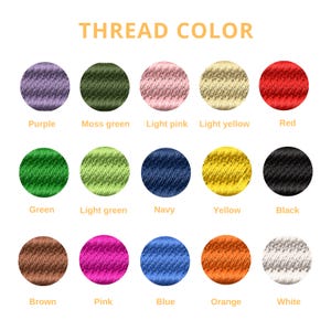 May include: A color chart displaying various thread colors. The chart includes circles of purple, moss green, light pink, light yellow, and red. Additional colors are green, light green, navy, yellow, black, brown, pink, blue, orange, and white. The text "THREAD COLOR" is at the top.