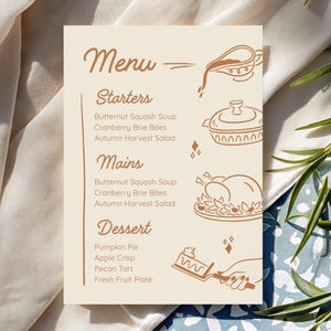 May include: A beige menu card with brown text and illustrations. The menu includes starters, mains, and dessert options. The illustrations include a gravy boat, a covered dish, a roasted turkey, and a pie server.