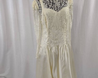 Wedding dress in ivory tea length lace