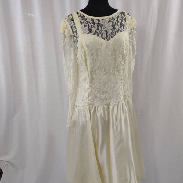 Wedding dress in ivory tea length lace