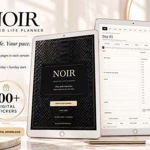 May include: Two tablets displaying the Noir Undated Life Planner. The left screen shows a black snakeskin cover with the text Noir Undated Life Planner. The right screen shows a daily planner layout with a schedule, tasks, and notes sections.