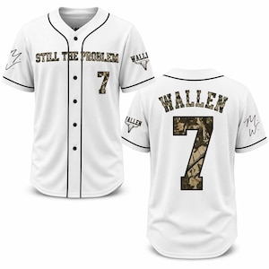 May include: White baseball jersey with black trim, featuring the text "STILL THE PROBLEM" and "WALLEN". The number "7" is in a camouflage pattern. Includes a signature on the sleeve.