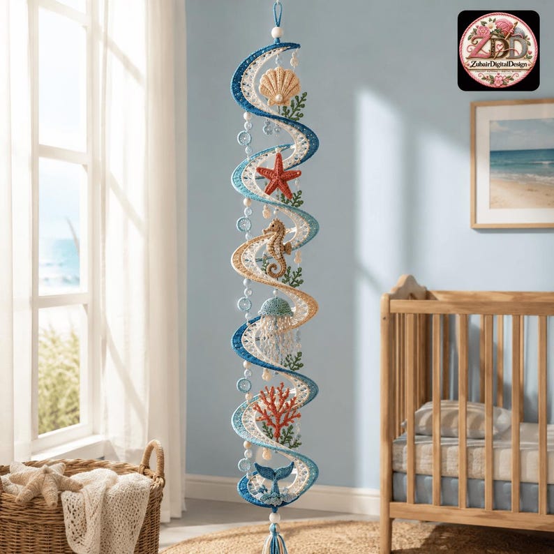May include: A vertical hanging mobile featuring a spiral design in shades of blue and white, decorated with crocheted sea life including a seashell, a red starfish, a seahorse, a jellyfish, red coral, and a blue whale tail, finished with beads.