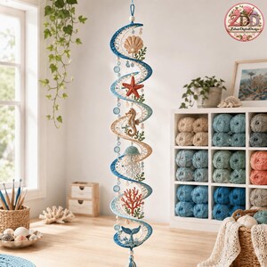 May include: A vertical spiral wall hanging featuring crocheted ocean-themed elements including a seashell, a red starfish, a seahorse, a jellyfish, coral, and a whale tail, accented with blue and white beads and intricate lace-like crochet patterns.