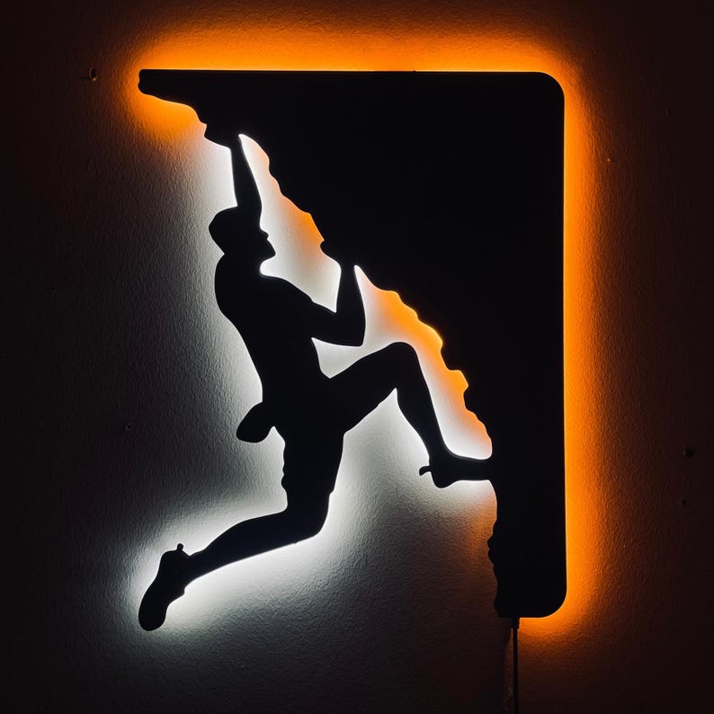 Rock climber LED metal wall art in matte black steel