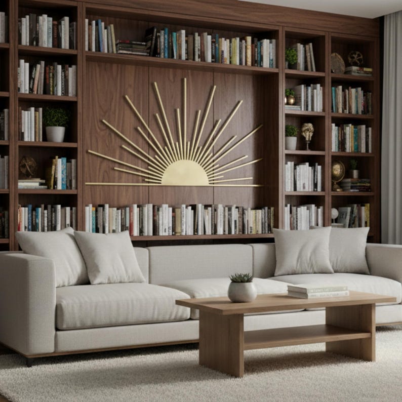 Golden sunburst metal art displayed on a living room bookshelf