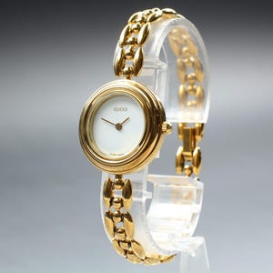 Gucci gold vintage watch - Etsy 日本