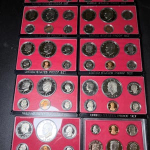10 Vintage Proof Sets mix of 77,78, and 82. Just begging to be liberated from its plastic holders. 59 mirrorlike proof coins!