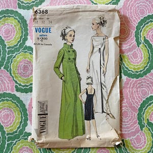 May include: A vintage Vogue sewing pattern envelope numbered 6368, size 12, featuring illustrations of a long-sleeved lime green coat, a floor-length white sleeveless dress, and a short black sleeveless dress with a square neckline.