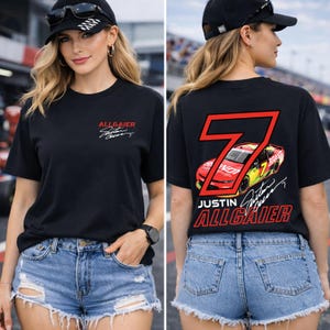 May include: Black short-sleeved t-shirt featuring the name "ALLGAIER" in red, with a signature and a race car graphic on the back. The front of the shirt also has the name "ALLGAIER" in red.