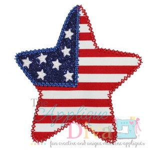 May include: A red, white and blue star-shaped patch with a glittery finish. The star is decorated with a smaller blue star with white stars inside, resembling the American flag.