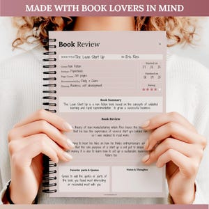 May include: A spiral-bound book review journal featuring the title "Book Review" and details for "The Lean Start Up." The journal includes sections for book summary, review, quotes, and notes. The cover reads "Made with Book Lovers in Mind."